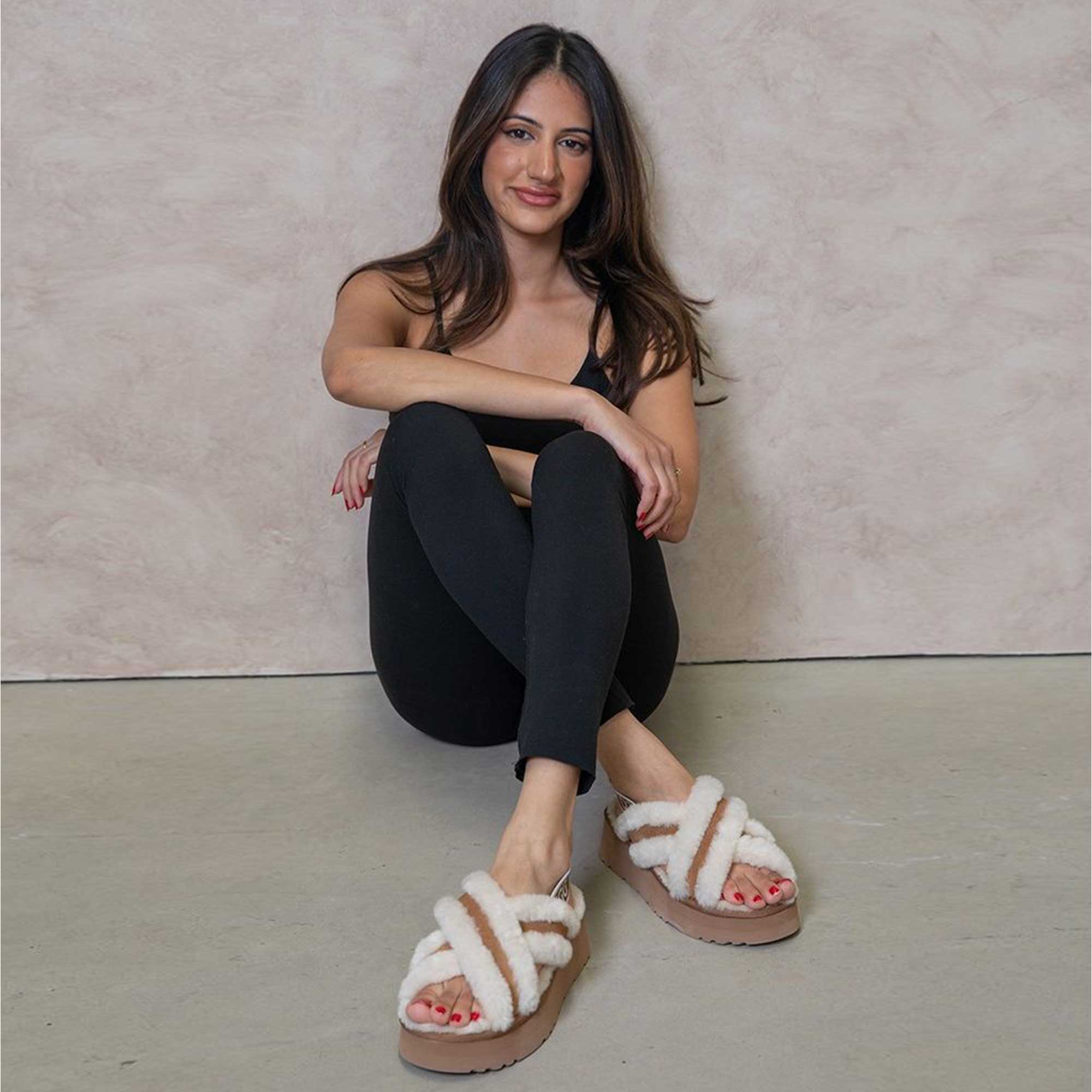 enjoying UGG slippers after workout