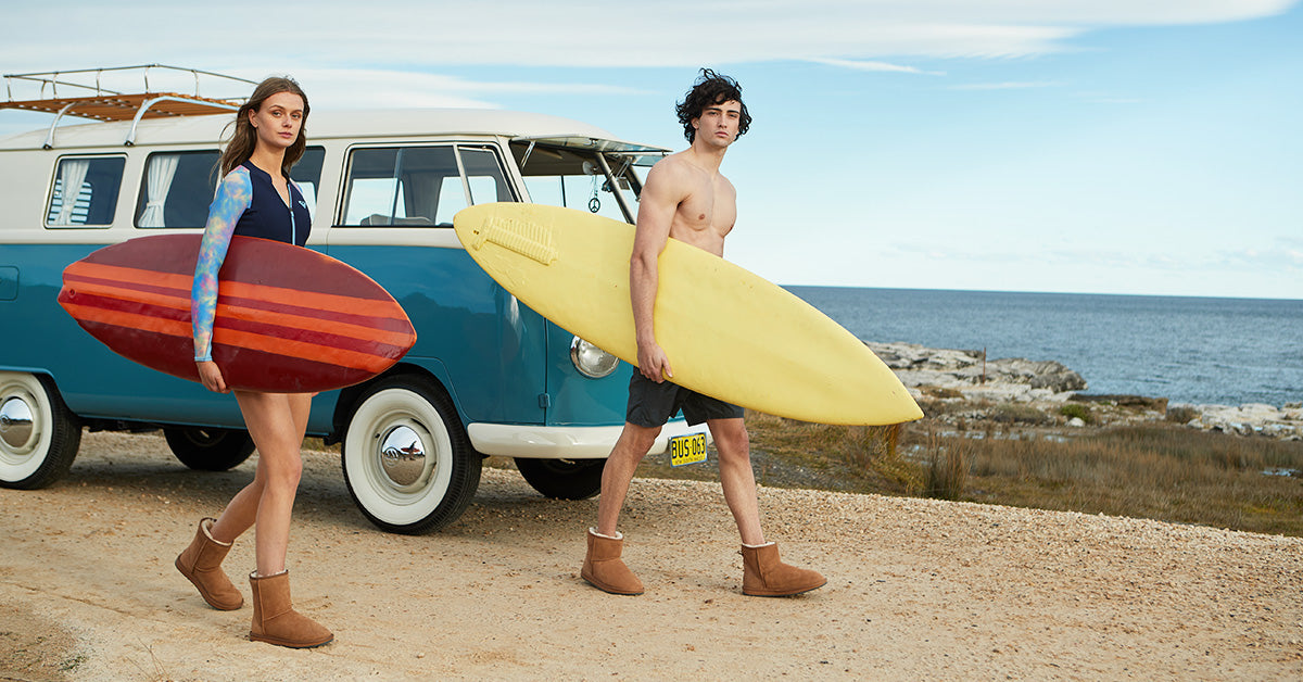 couple wearing UGG boots they want to live in after surfing