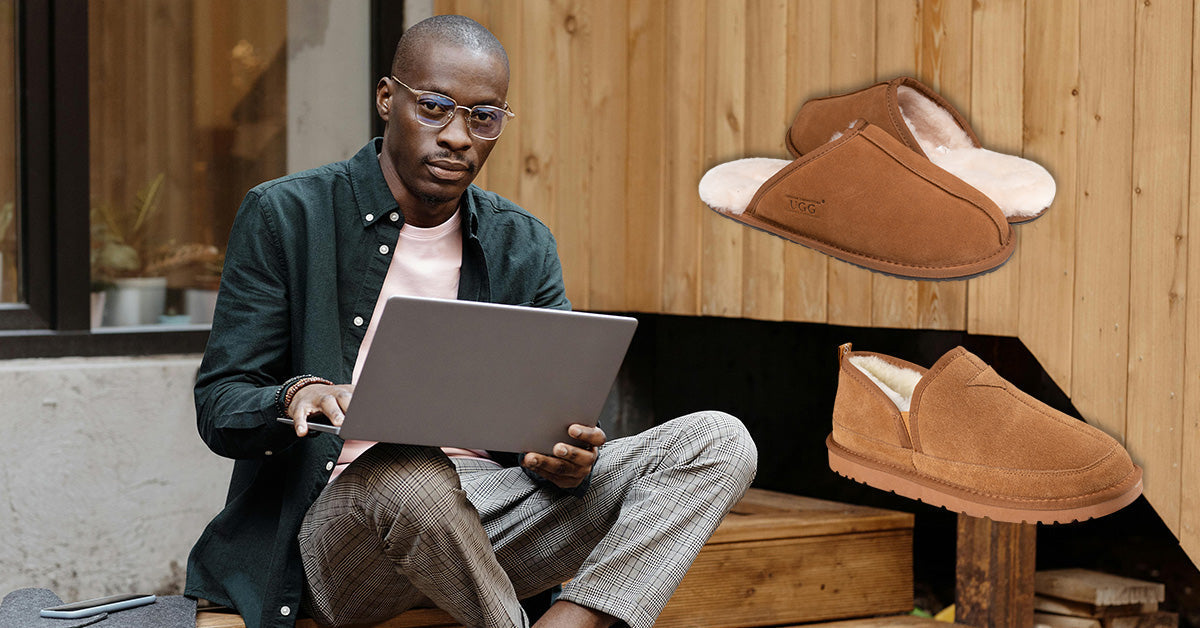 man working while wearing UGG slippers for everyday use