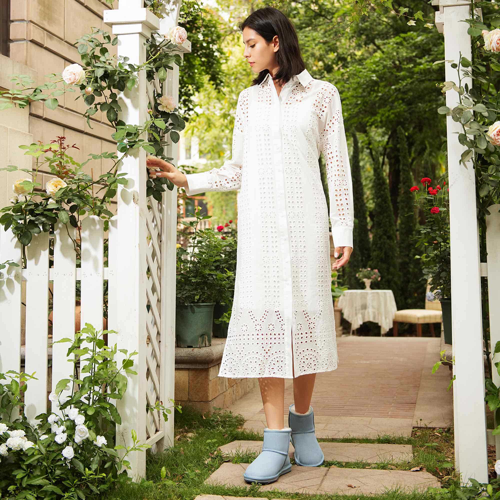woman-looking-stylish-and-cosy-at-a-flower-farm-wearing-ugg-classic-short-boots