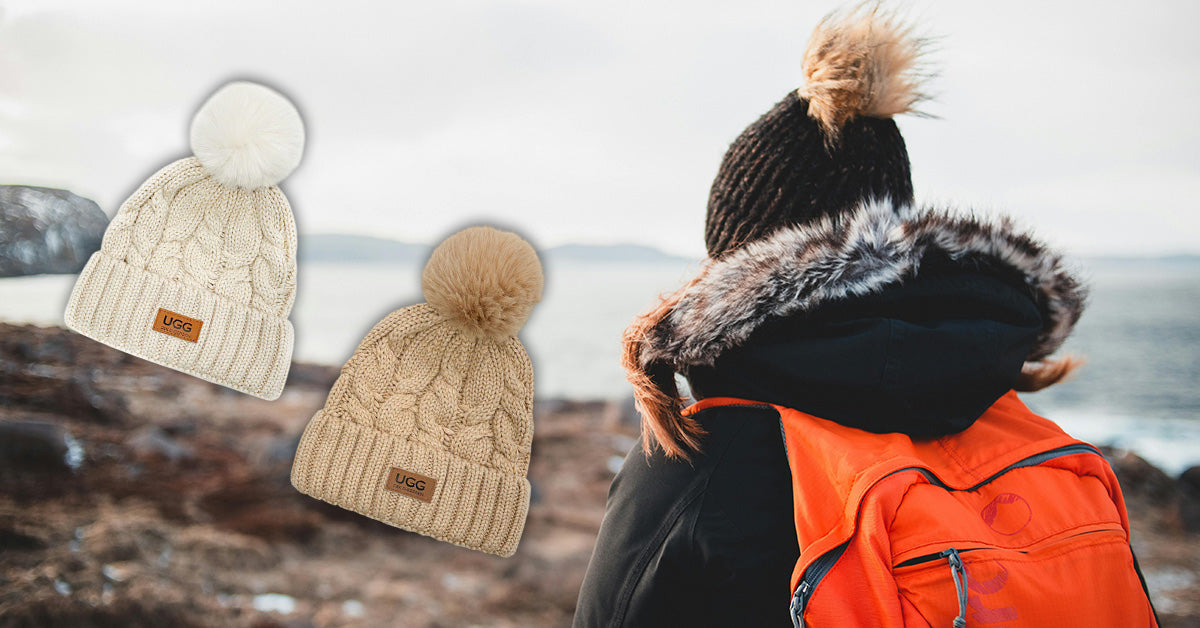woman outdoors wearing UGG fluffy hat as winter essential