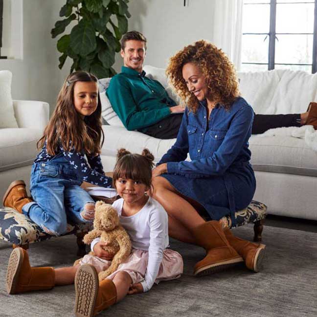 an australian family wearing UGG boots at the living room