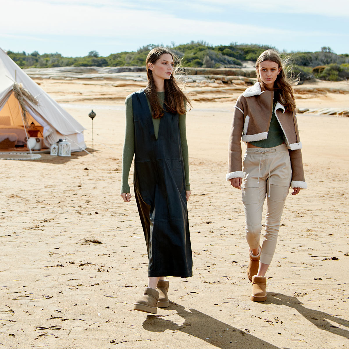 two very stylish girls wearing UGG boots 