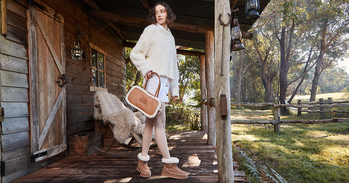 woman exploring the province fashionably with matching UGG boots and UGG bag